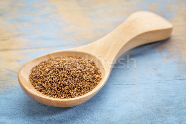 teff grain in wooden spoon Stock photo © PixelsAway