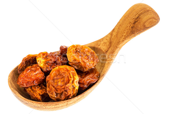 dried goldenberries on  wooden spoon Stock photo © PixelsAway