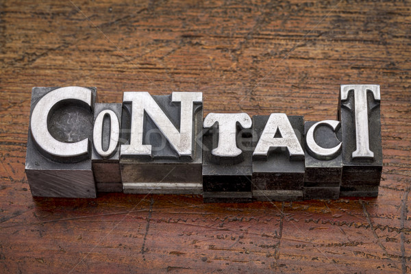 contact word in metal type Stock photo © PixelsAway