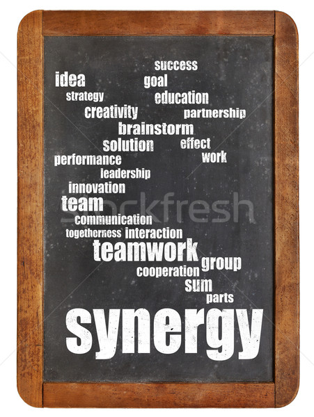 synergy word cloud on blackboard Stock photo © PixelsAway