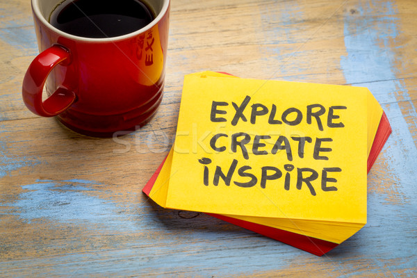 Stock photo: explore, create, inspire concept on napkin 