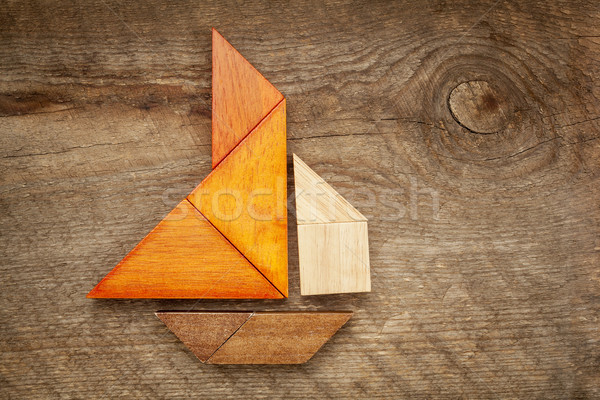 abstract sailboat from tangram puzzle Stock photo © PixelsAway