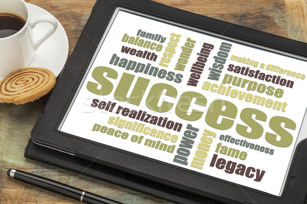 Stock photo: success word cloud on tablet