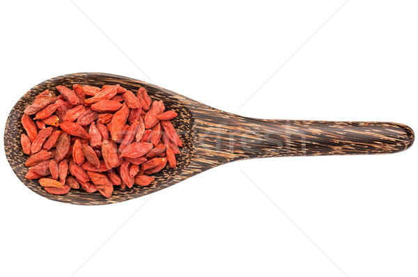 goji berries on wooden spoon Stock photo © PixelsAway