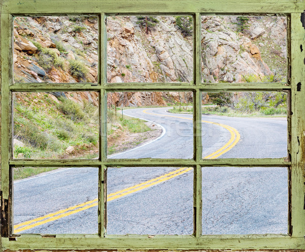 travel concept - windy road through old window Stock photo © PixelsAway
