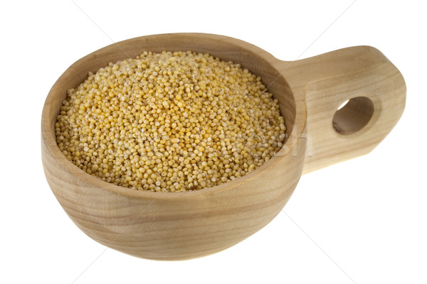 scoop of hulled millet grain Stock photo © PixelsAway
