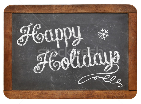 Happy Holidays on blackboard Stock photo © PixelsAway