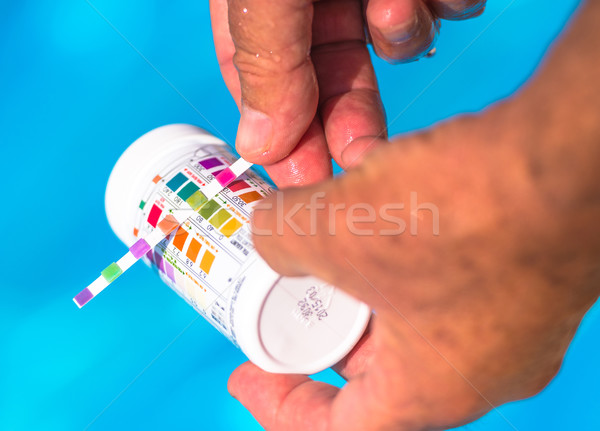Stock photo: Check the Ph of a private swimming pool