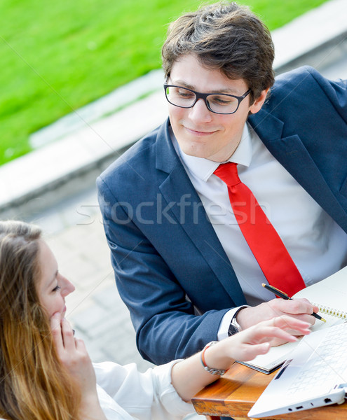 Young executive business team outdoors at a table Stock photo © pixinoo