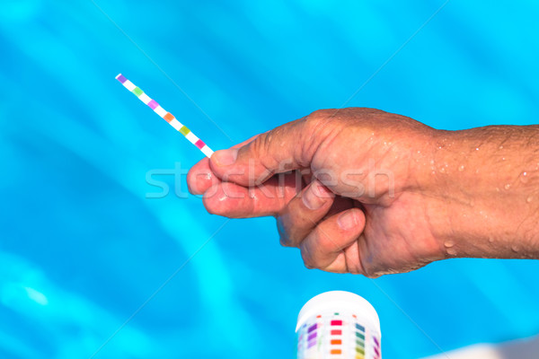 Check the Ph of a private swimming pool Stock photo © pixinoo