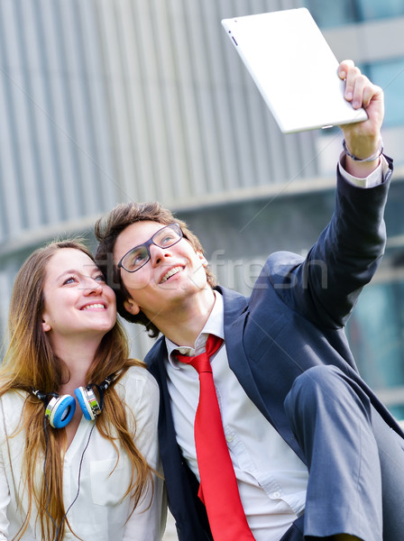 Jeunes affaires couple photo comprimé [[stock_photo]] © pixinoo