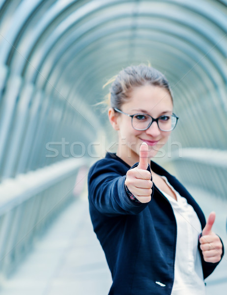 Réussi femme d'affaires sur bureau affaires [[stock_photo]] © pixinoo