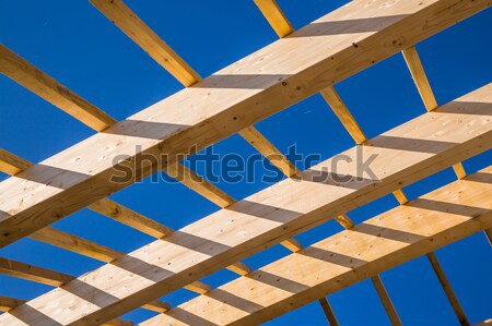 Residential construction home framing against a blue sky Stock photo © pixinoo