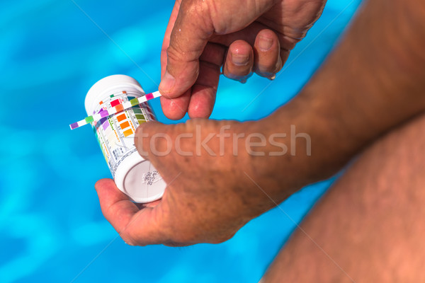 Check the Ph of a private swimming pool Stock photo © pixinoo