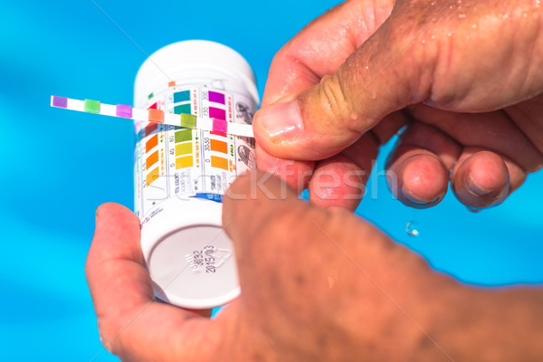 Stock photo: Check the Ph of a private swimming pool
