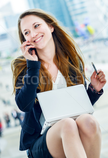 dynamic young executive taking notes on her agenda Stock photo © pixinoo