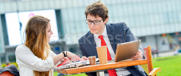 Sales force team outdoors at a table Stock photo © pixinoo