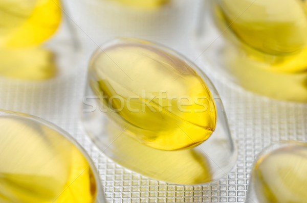 Yellow pills Stock photo © pixpack