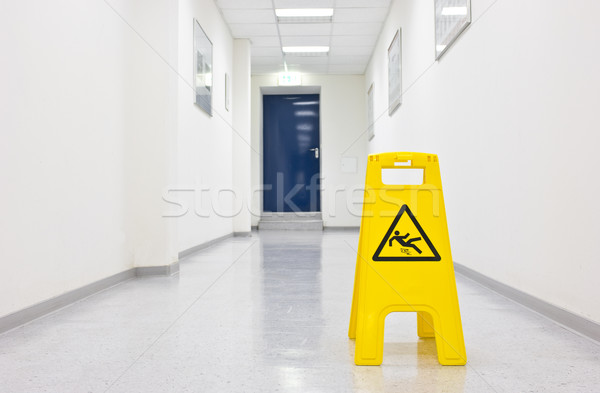 Stock photo: Warning sign for slippery floor