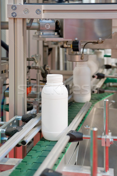 Mass production of plastic bottles Stock photo © pixpack