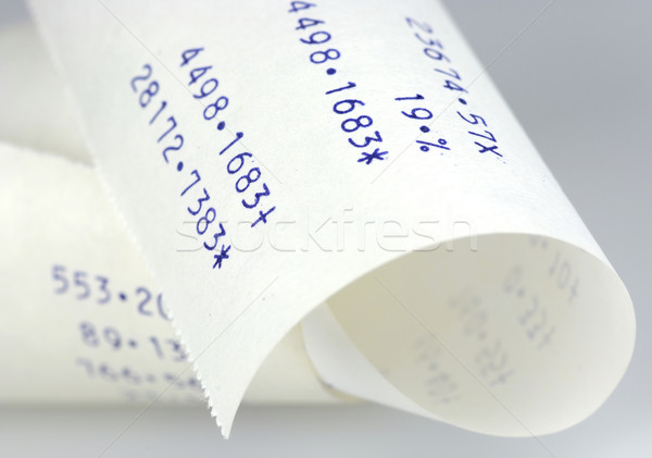 Paper strips of a calculating machine Stock photo © pixpack