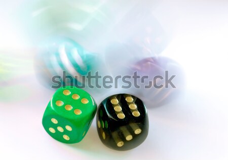 Falling dies in motion blurr Stock photo © pixpack