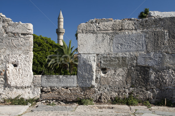 Minaret tower and castle wall in Kos city; Greece Stock photo © PiXXart