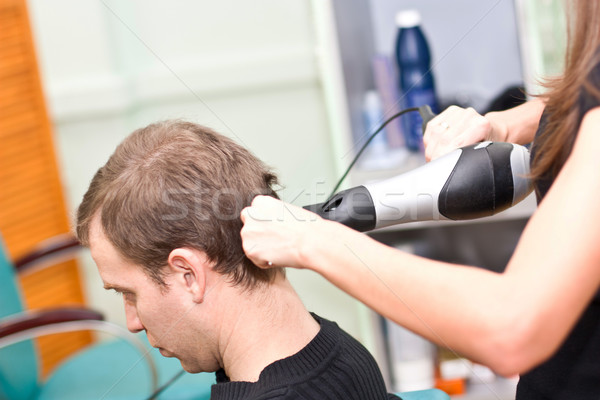 Hairdresse dry guy hair Stock photo © podsolnukh