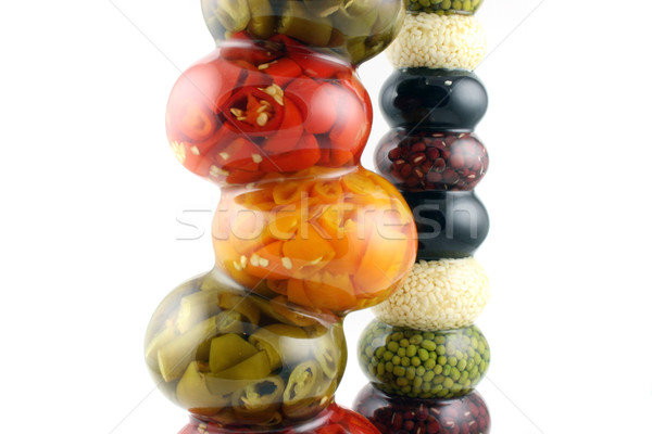 Stock photo: Bottles of spiced Chilies