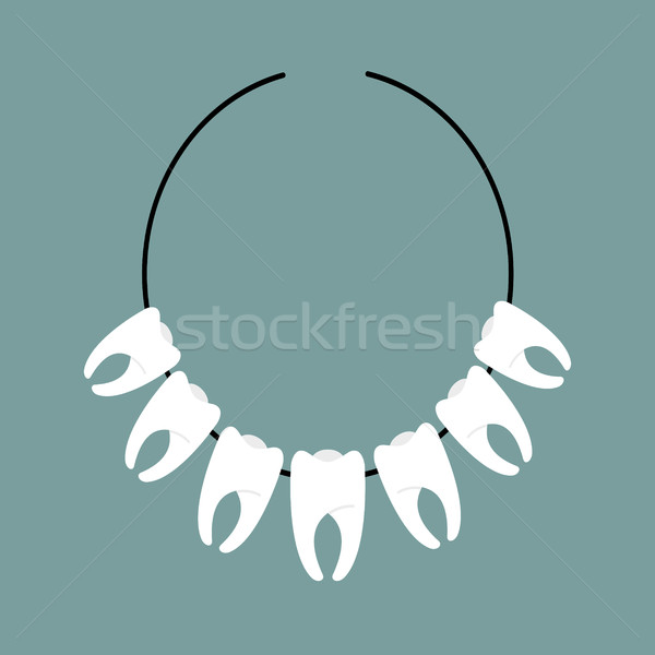 Necklace of teeth. Decoration on neck of  Indians. Mascot for Ab Stock photo © popaukropa