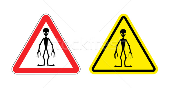 Warning sign of attention aliens. Hazard yellow sign space invad Stock photo © popaukropa