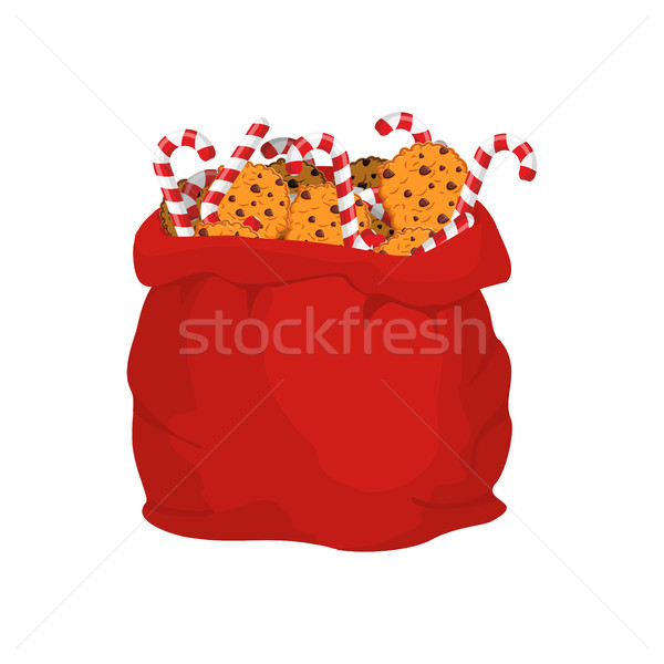 Santa bag of cookies and peppermint stick. Christmas sack and co Stock photo © popaukropa