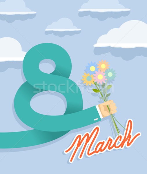 8 march. Businessman hand holding bouquet of  flowers Stock photo © popaukropa