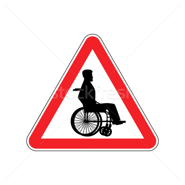 Warning invalid. Sign caution wheelchair on road. Danger way sym Stock photo © popaukropa