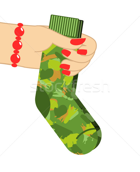 February 23. Female hand to give socks. Traditional gift for mil Stock photo © popaukropa