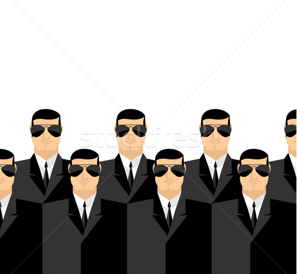 Bodyguards in dark suits and dark glasses. Secret Service agents Stock photo © popaukropa