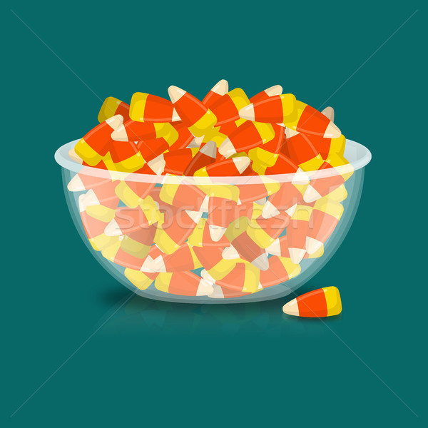 Stock photo: Bowl and candy corn. Sweets on plate. Traditional Treats for Hal