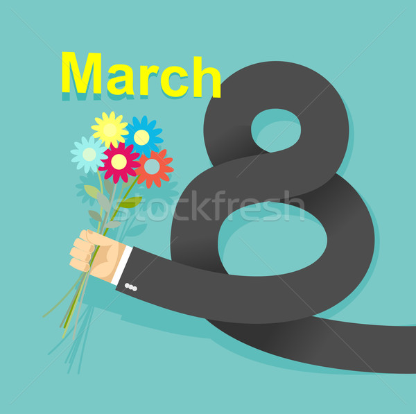 8 march. Businessman hand holding bouquet of  flowers Stock photo © popaukropa