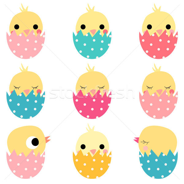 Cute Easter hatching chickens in colored eggs Stock photo © Pravokrugulnik