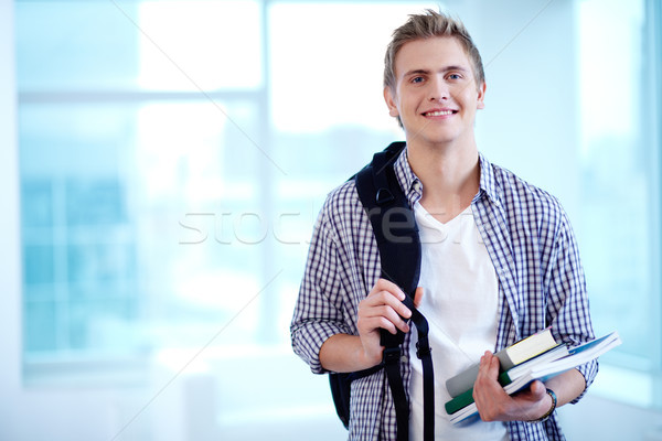 Diák főiskola fiatal fickó hátizsák tankönyvek Stock fotó © pressmaster