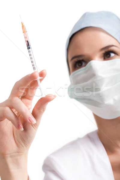 Arzt Spritze Krankenschwester Maske schauen Nadel Stock foto © pressmaster