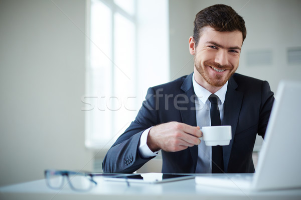 Werkgever werk knap zakenman thee koffie Stockfoto © pressmaster