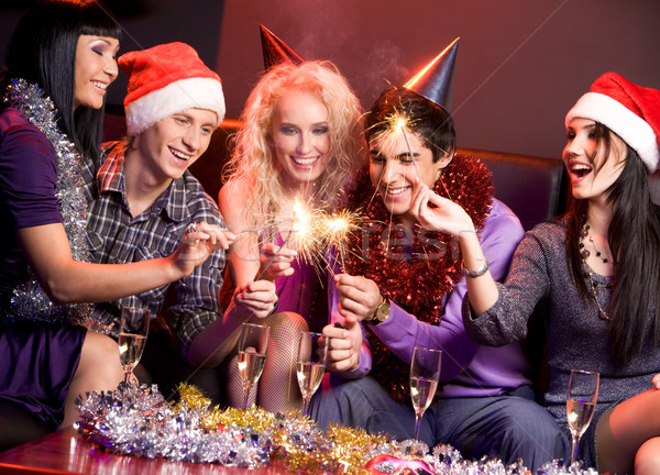 Weihnachten Spaß Foto heiter Freunde lachen Stock foto © pressmaster