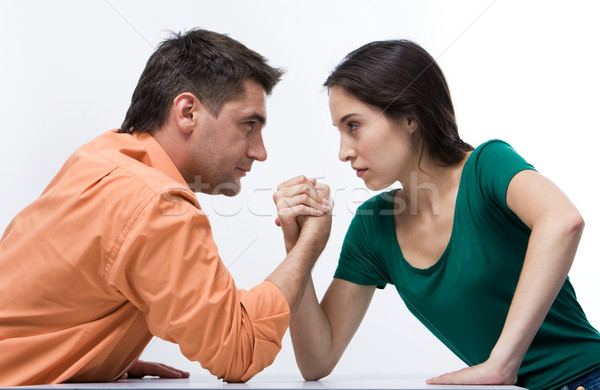 Konfrontacja człowiek kobieta armwrestling działalności Zdjęcia stock © pressmaster