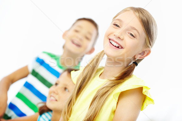 Extatisch portret lachend meisje twee klasgenoten Stockfoto © pressmaster