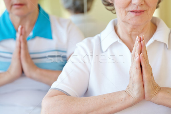 Medytacji kobiet jogi wykonywania równowagi Zdjęcia stock © pressmaster