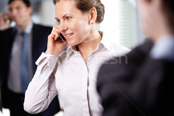 Businesswoman phoning Stock photo © pressmaster