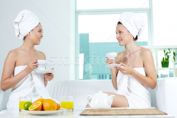 Girls having tea Stock photo © pressmaster