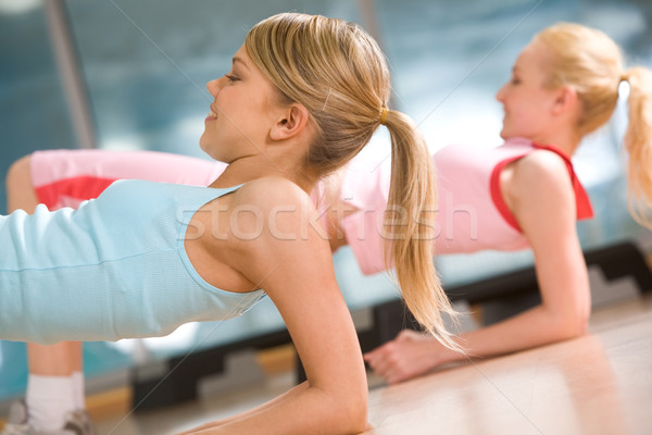 Standing on elbows Stock photo © pressmaster