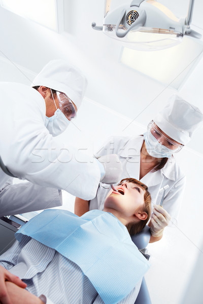 Tandheelkundige kliniek afbeelding patiënt vergadering fauteuil Stockfoto © pressmaster